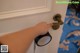 A person opening a door with a magnifying glass.